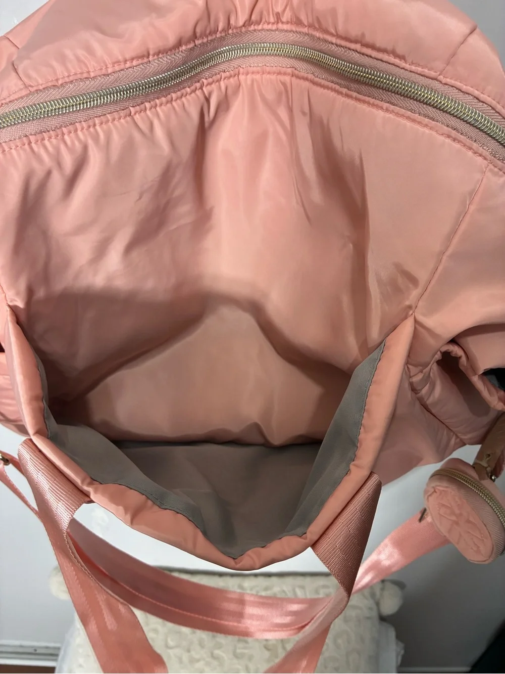 Skip Hop Suite 6-In-1 Diaper Bag in blush pink with quilted details. EUC